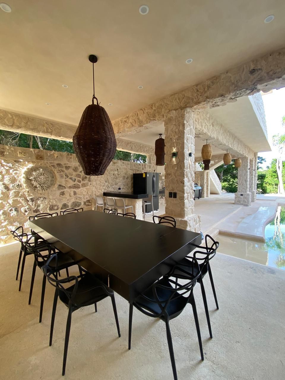 Vista de exteriores de Villa Aaktun al atardecer, Tulum